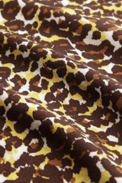 Betsy Rollneck Top Hustle